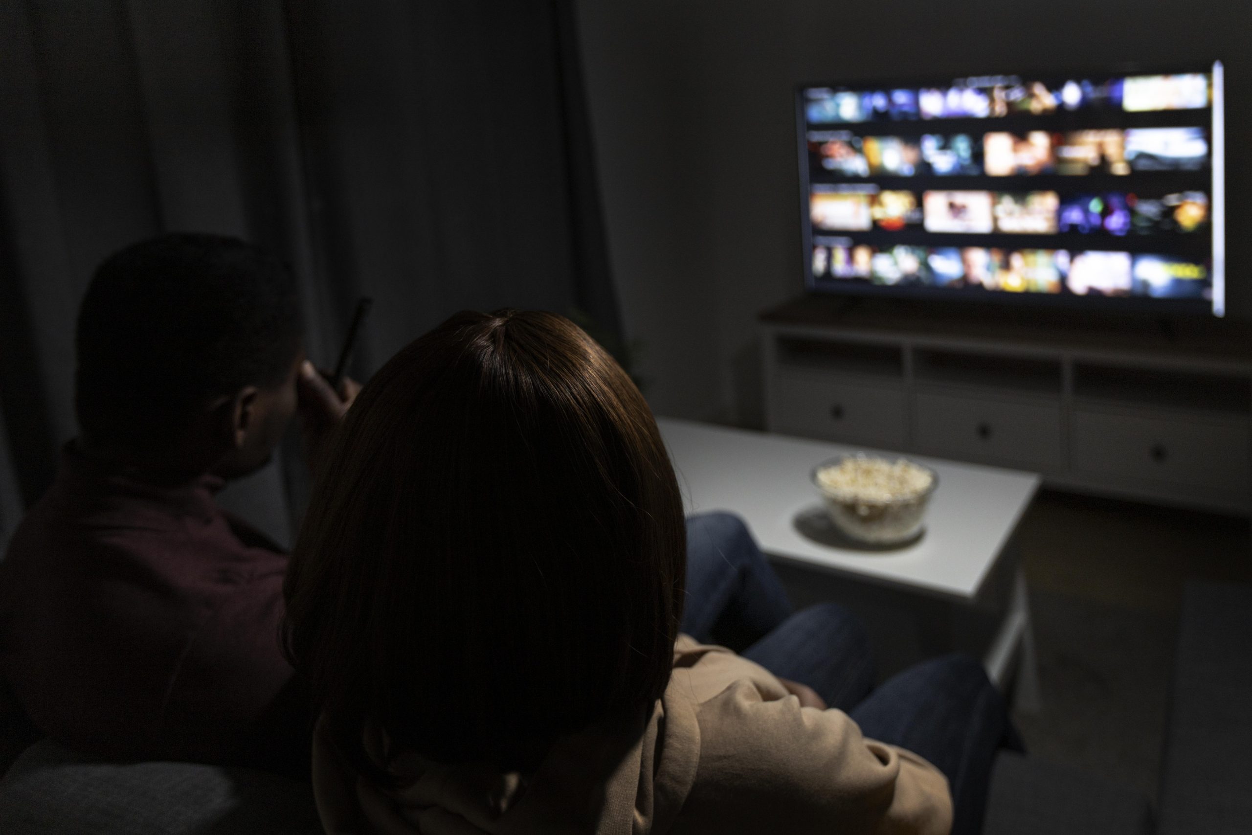 couple watching streaming service together home indoors1 scaled