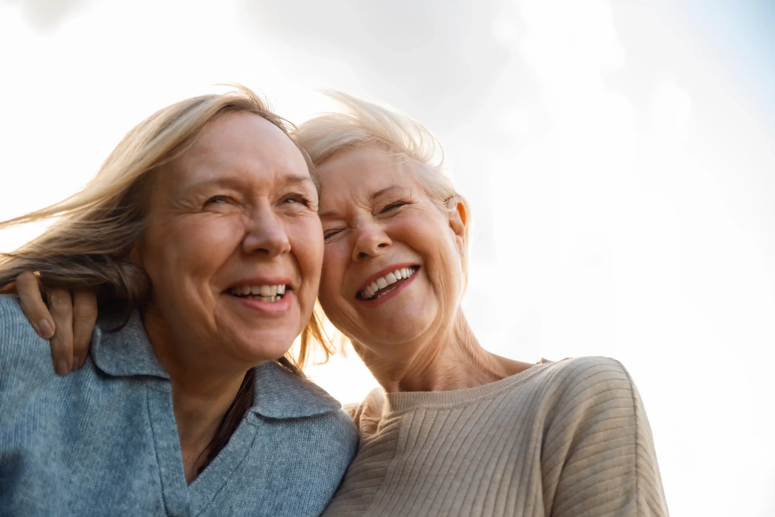 low angle smiley women nature scaled