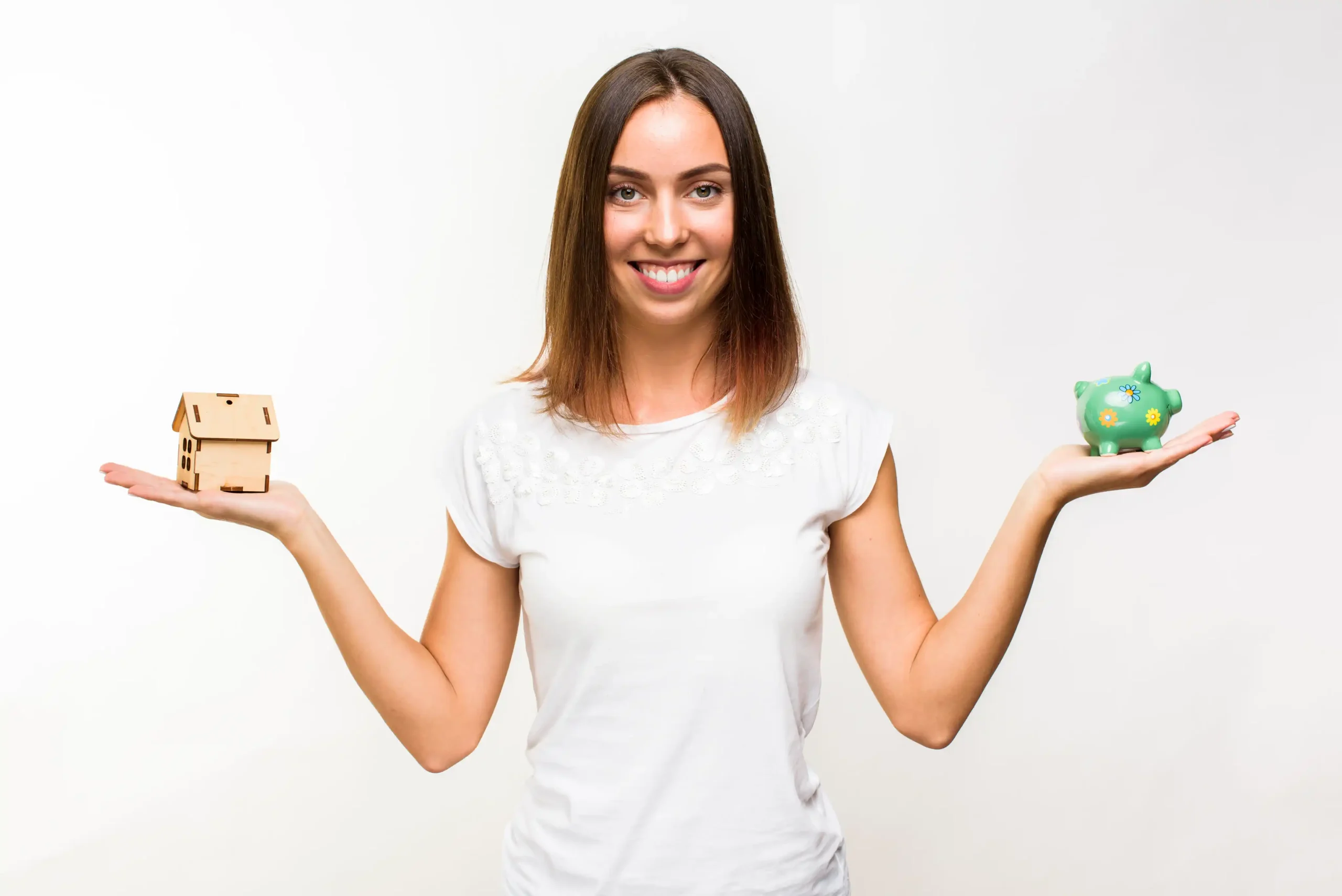 pretty young woman with cottage piggy bank scaled