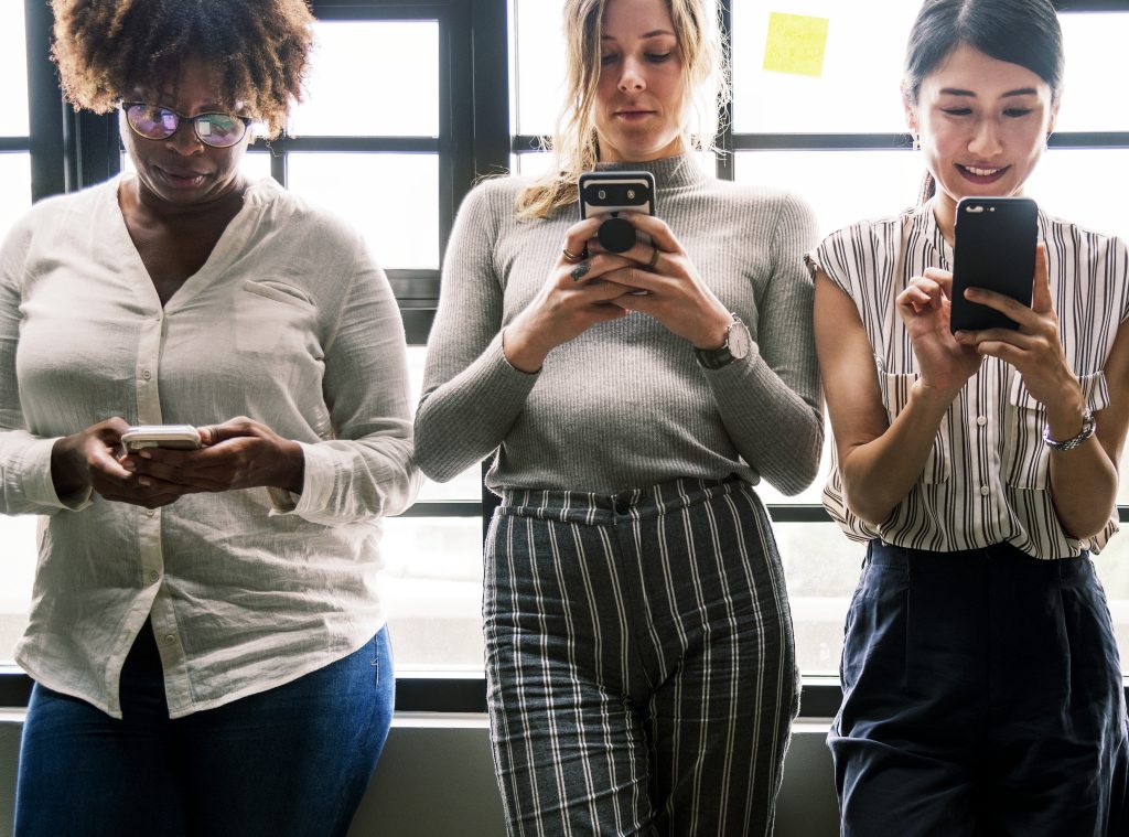 group diverse people using smartphones